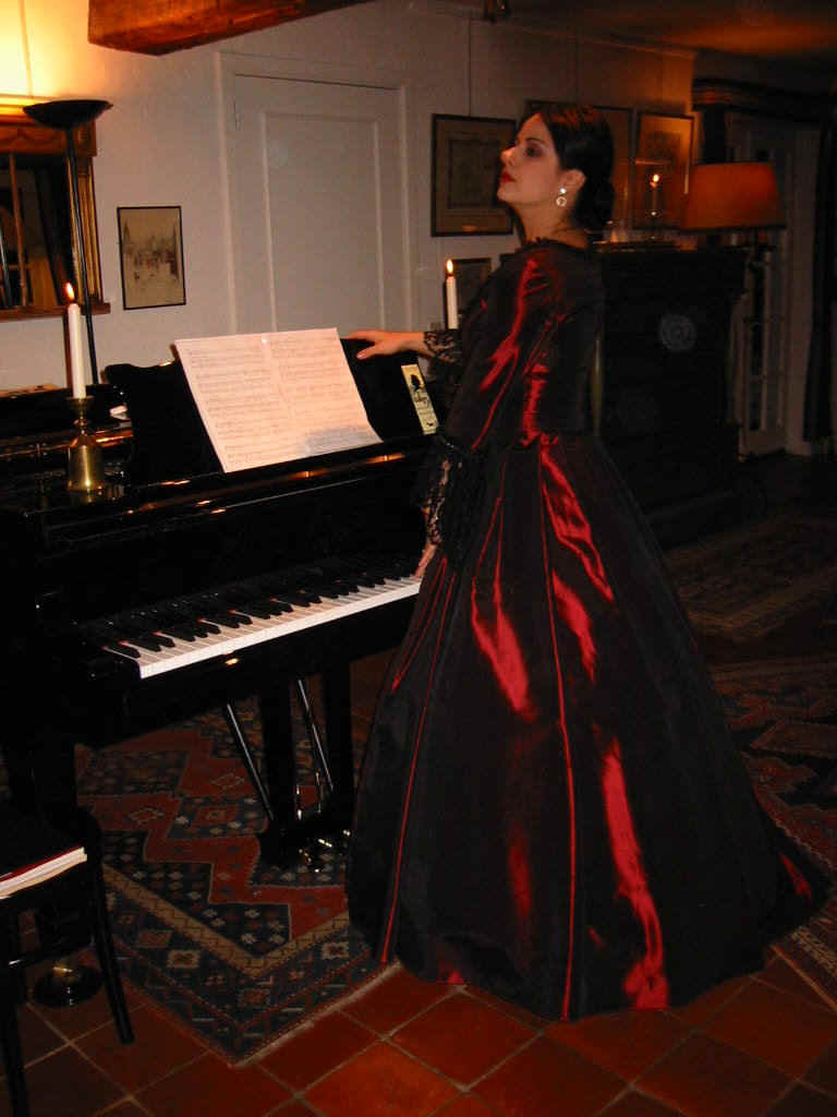 Act 5, Death:  Ljiljana Jovanovic standing at the piano singing and playing for Chopin as Delfina Potocka did on 15 October 1849.
